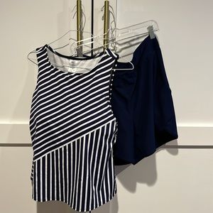 2 pieces:Swim top is 18W DD, Swim shorts are 18W